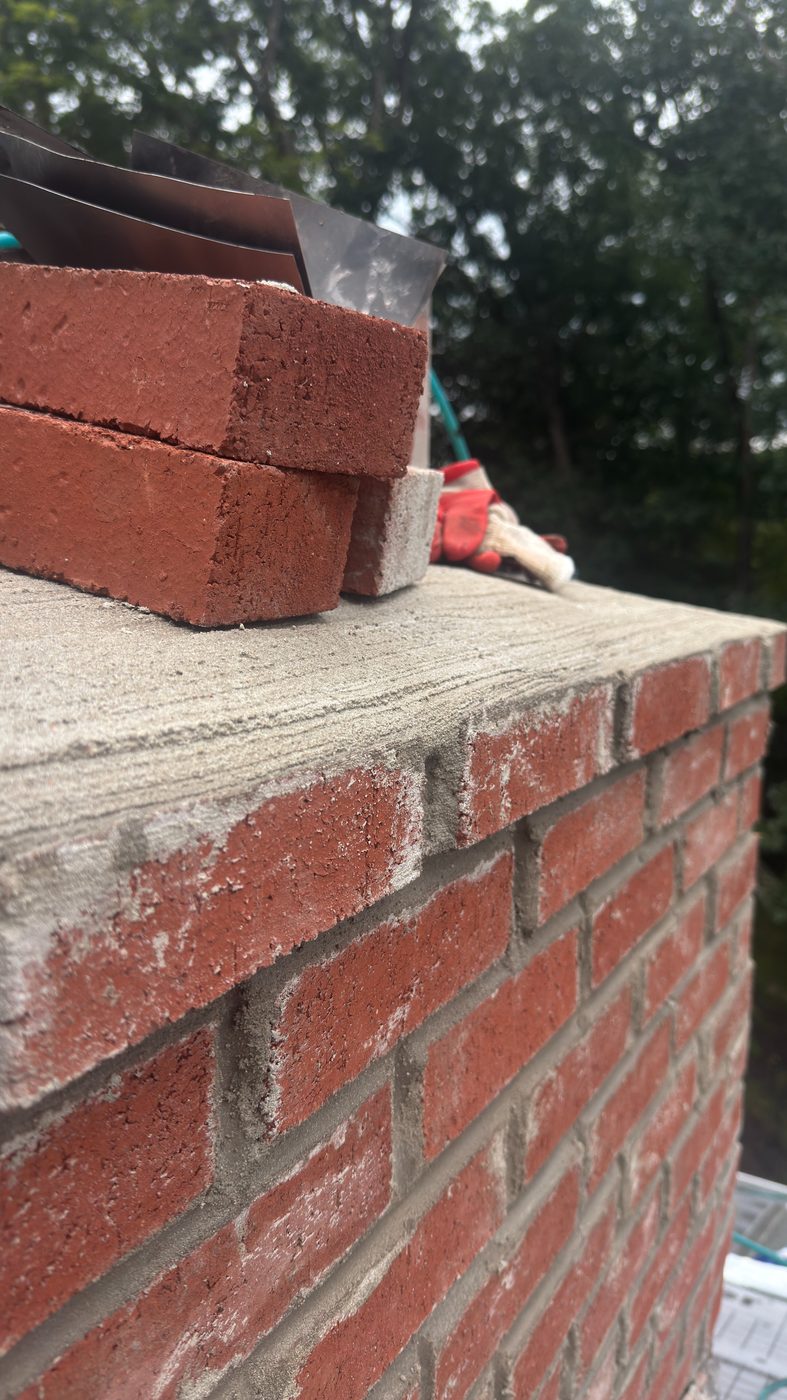 Freshly poured concrete chimney crown during a rebuild in Morris County NJ